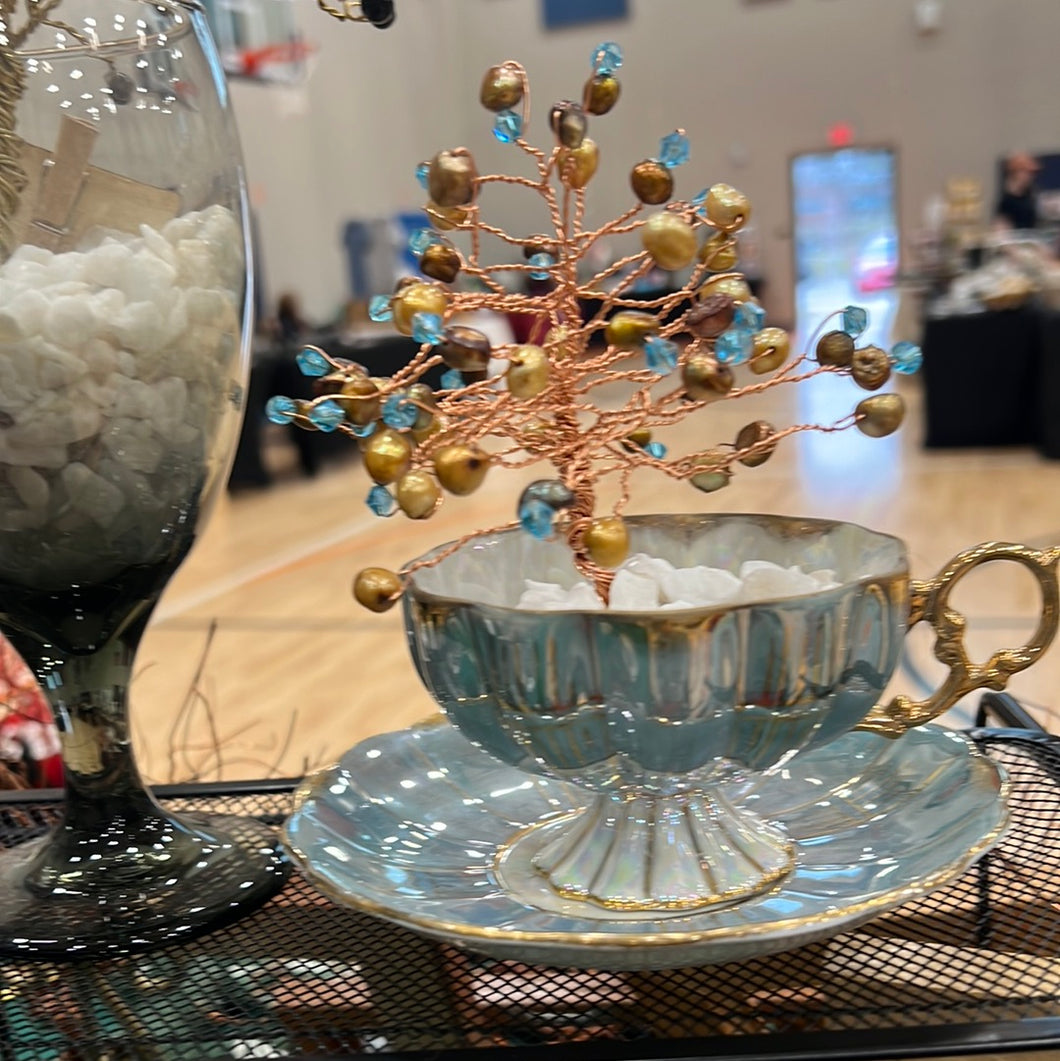 Shells and blue sparkles tea cup